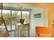 Cozy dining area with pool views, perfect for meals with a relaxing view at 4307 Gulf Dr # 208, Holmes Beach, FL 34217