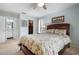 Cozy bedroom with queen bed and ensuite bathroom at 4411 Violet Ave, Sarasota, FL 34233