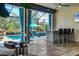 Screened in pool area features a bar, hot tub, and welcoming blue accents at 4543 Terrazza Ct, Lakewood Ranch, FL 34211