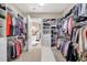 Large walk-in closet with custom shelving and ample storage space at 4543 Terrazza Ct, Lakewood Ranch, FL 34211