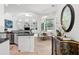 Bright open-concept kitchen with sleek countertops and modern appliances at 5063 Timber Chase Way, Sarasota, FL 34238