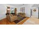 Cozy living room featuring comfortable seating, elegant decor, and natural light at 5063 Timber Chase Way, Sarasota, FL 34238