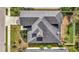 Aerial view showcasing the detailed roof and landscaping of this well-maintained property at 5718 Westhaven Cv, Bradenton, FL 34203