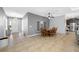 Inviting dining room with tile floors, chandelier, and ample natural light at 5821 Hevena Ct, Palmetto, FL 34221