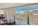 Enjoy the ocean views from this balcony with stylish seating and outdoor living at 6500 Sunset Way # 311, St Pete Beach, FL 33706