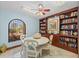 Bright dining room featuring a ceiling fan and tile floors at 6500 Sunset Way # 311, St Pete Beach, FL 33706