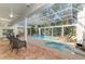 Beautiful screened-in patio with a pool and spa, perfect for outdoor enjoyment at 67 Sugar Mill Dr, Osprey, FL 34229