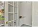 Stylish powder room featuring granite countertops and green tile flooring at 67 Sugar Mill Dr, Osprey, FL 34229