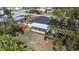 Aerial view of a home with a screened-in porch and a spacious backyard at 6705 20Th W Ave, Bradenton, FL 34209