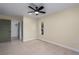 This bedroom features a ceiling fan, walk-in closet and a window to bring in natural light at 6705 20Th W Ave, Bradenton, FL 34209