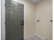 Mud room with tile floors, neutral paint, and access to the garage or backyard at 6705 20Th W Ave, Bradenton, FL 34209