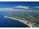 Expansive aerial view of Siesta Key's coastline, showcasing its pristine beaches and clear blue waters at 746 Plymouth St, Sarasota, FL 34242