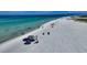 Stunning aerial view of the beach showcasing the white sand and turquoise water at 746 Plymouth St, Sarasota, FL 34242