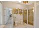 Bathroom featuring tiled flooring, a toilet, bidet, and glass-enclosed shower area at 746 Plymouth St, Sarasota, FL 34242