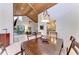 Cozy dining room featuring wood-beam ceilings and a unique stained-glass chandelier at 7921 4Th W Ave, Bradenton, FL 34209