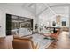 Bright open living room showcasing natural light, modern furnishings, and sliding glass doors to the patio at 8487 Lindrick Ln, Bradenton, FL 34202