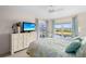 Tranquil main bedroom featuring bright windows with a scenic water view and a light, airy design at 866 Audubon Dr, Bradenton, FL 34209