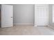 Bright bedroom with tile flooring and a closet at 9590 Knightsbridge Cir, Sarasota, FL 34238