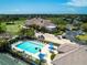 Community clubhouse and pool, offering resort-style amenities and recreation for residents and guests at 9590 Knightsbridge Cir, Sarasota, FL 34238