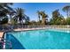 Community pool, offering a refreshing oasis for residents to relax and enjoy the outdoors at 9590 Knightsbridge Cir, Sarasota, FL 34238