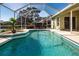 Enclosed pool with sun-drenched water, and well-maintained pool-side area for leisure at 9590 Knightsbridge Cir, Sarasota, FL 34238