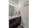 Bathroom featuring a vanity with marble counter at 1038 Grantham Dr, Sarasota, FL 34234