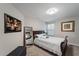 Bright bedroom with large mirror, a comfy bed, and soft natural light creates a relaxing retreat at 1038 Grantham Dr, Sarasota, FL 34234