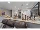 Kitchen view features granite countertops, a breakfast bar, and stainless steel appliances at 1038 Grantham Dr, Sarasota, FL 34234