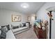 Inviting living room features a comfortable couch, television, and tasteful decor, creating a cozy atmosphere at 1038 Grantham Dr, Sarasota, FL 34234