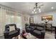 Spacious living room with plenty of seating space and natural light from sliding glass doors at 1038 Grantham Dr, Sarasota, FL 34234