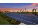 Community basketball court with well-maintained landscaping and sunset sky at 14906 Lyla Ter, Bradenton, FL 34211