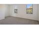 Light-filled bedroom with neutral carpet, providing a serene atmosphere at 14906 Lyla Ter, Bradenton, FL 34211