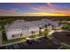 Exterior of a large, modern community clubhouse with ample parking at 14906 Lyla Ter, Bradenton, FL 34211