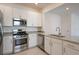 Well-equipped kitchen with stainless steel appliances and granite counters at 14906 Lyla Ter, Bradenton, FL 34211