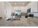 Bright kitchen featuring stainless appliances, granite counters and ample cabinet space at 14906 Lyla Ter, Bradenton, FL 34211