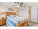 Inviting bedroom with hardwood floors and natural light at 155 Jose Gaspar Dr # 155, Englewood, FL 34223