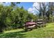 Convenient canoe storage rack next to lush greenery, perfect for outdoor adventures at 155 Jose Gaspar Dr # 155, Englewood, FL 34223