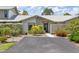 Charming single-story home featuring a well-maintained front yard and inviting entrance at 155 Jose Gaspar Dr # 155, Englewood, FL 34223