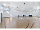 Spacious indoor basketball court with hardwood floors and ample lighting at 15607 White Linen Dr, Lakewood Ranch, FL 34211