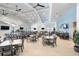 Indoor dining area featuring a sleek bar and comfortable seating arrangement at 15607 White Linen Dr, Lakewood Ranch, FL 34211