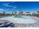 Community splash pad with water features and play equipment, offering a safe and fun environment at 15607 White Linen Dr, Lakewood Ranch, FL 34211