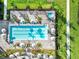 Aerial view of a lap pool surrounded by tropical landscaping and lounge chairs at 15607 White Linen Dr, Lakewood Ranch, FL 34211