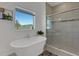 Bright bathroom featuring a soaking tub, glass shower, and serene atmosphere at 1901 Everson St, Bradenton, FL 34208