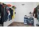 Walk-in closet with shelving and hanging rods provides ample storage space at 1901 Everson St, Bradenton, FL 34208