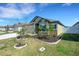 Beautifully landscaped front yard, complemented by vibrant green shutters and a well-kept lawn at 1901 Everson St, Bradenton, FL 34208