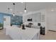 Spacious kitchen with large island, pendant lighting, and modern appliances at 1901 Everson St, Bradenton, FL 34208