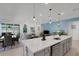 Open-concept kitchen overlooking dining and living areas, perfect for entertaining at 1901 Everson St, Bradenton, FL 34208