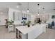 Bright kitchen with gray cabinets, large island, and stainless steel appliances at 1901 Everson St, Bradenton, FL 34208