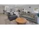 Open-concept living area with modern furnishings and seamless flow to the kitchen at 1901 Everson St, Bradenton, FL 34208