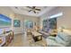 Living room featuring modern decor and a sliding glass door leading to outdoor seating at 2047 Roselawn St, Sarasota, FL 34231